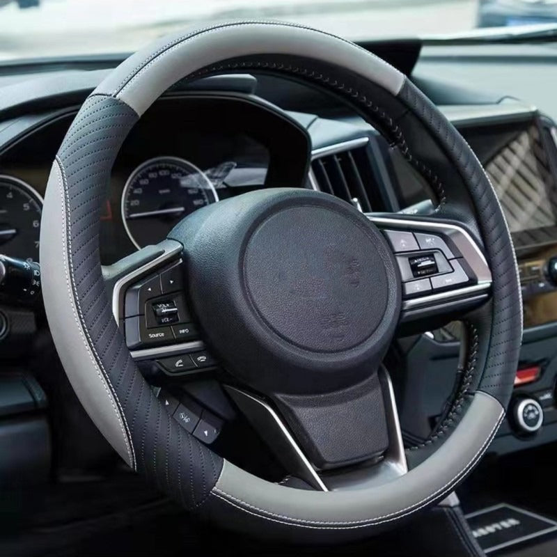 🔥Funda de volante de cuero genuino - Funda universal para volante de coche, antideslizante, duradera