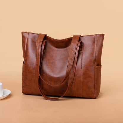 ✨👜【Velika kapaciteta】Ženska torba za čez ramo iz mehkega usnja, novost 2025.