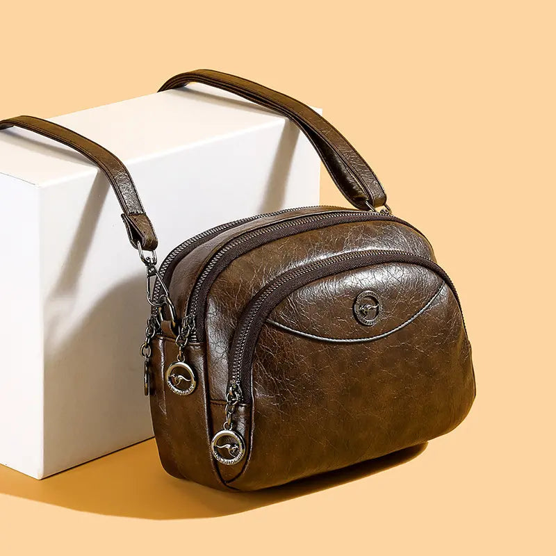 👜【Vrhunski material iz pravega usnja】Elegantna torba za čez ramo za ženske